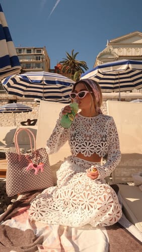 Customer photo review of Balmy Summers Crochet Lace Floral Pattern Long Sleeve Crop Vacation Top