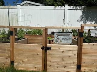 Customer photo review of And Into The Garden I Go Gardening Girl - Garden Sign - Personalized Custom Classic Metal Signs