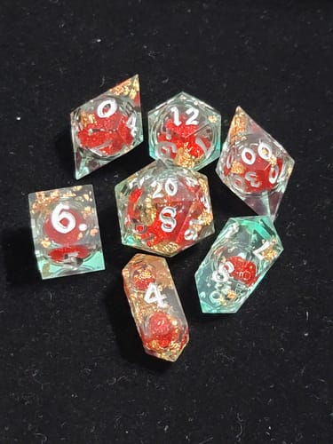 Customer photo review of Red And Gold Glitter Liquid Core Handmade Resin DND Dice Set