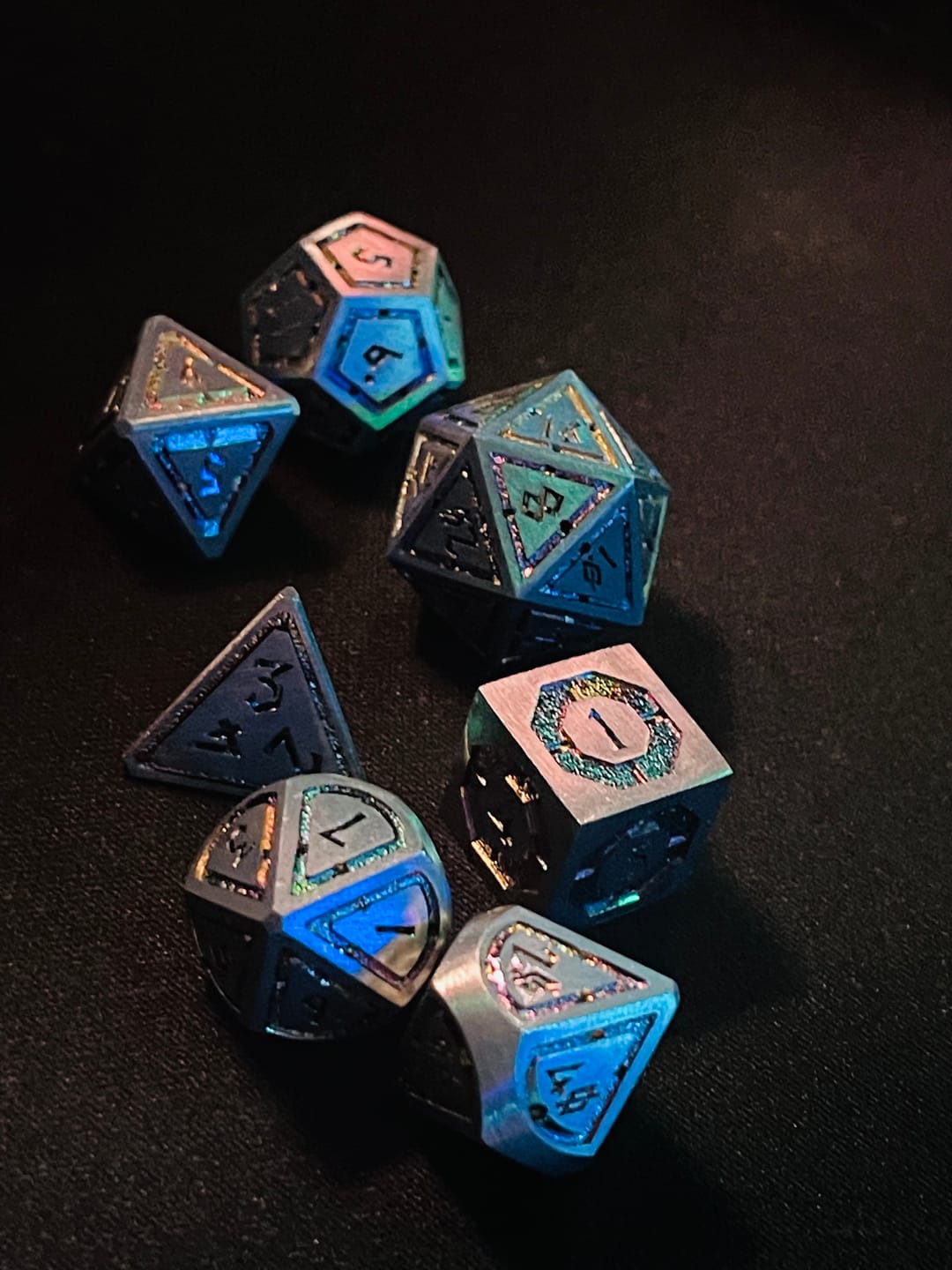 Customer photo review of Cleric's Domain Silver Iridescent Metal Dice Set