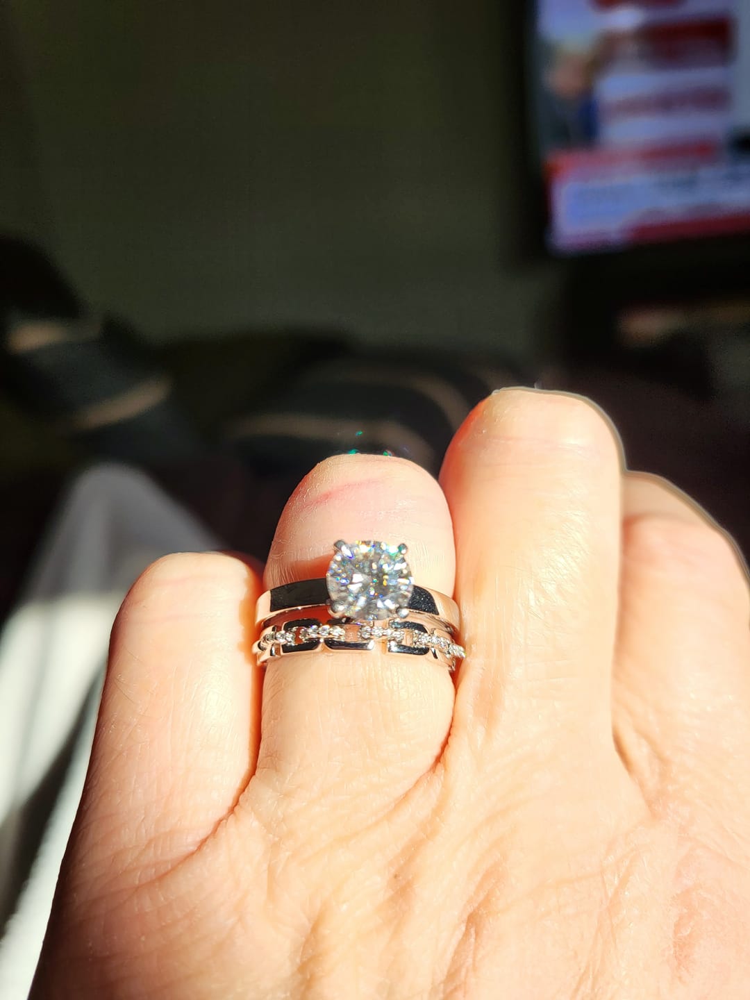 Customer photo review of Solitaire Moissanite Four Prong Flat Shank Engagement Ring