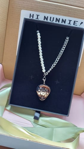 Customer photo review of BTS Suga Amygdala Jewelry