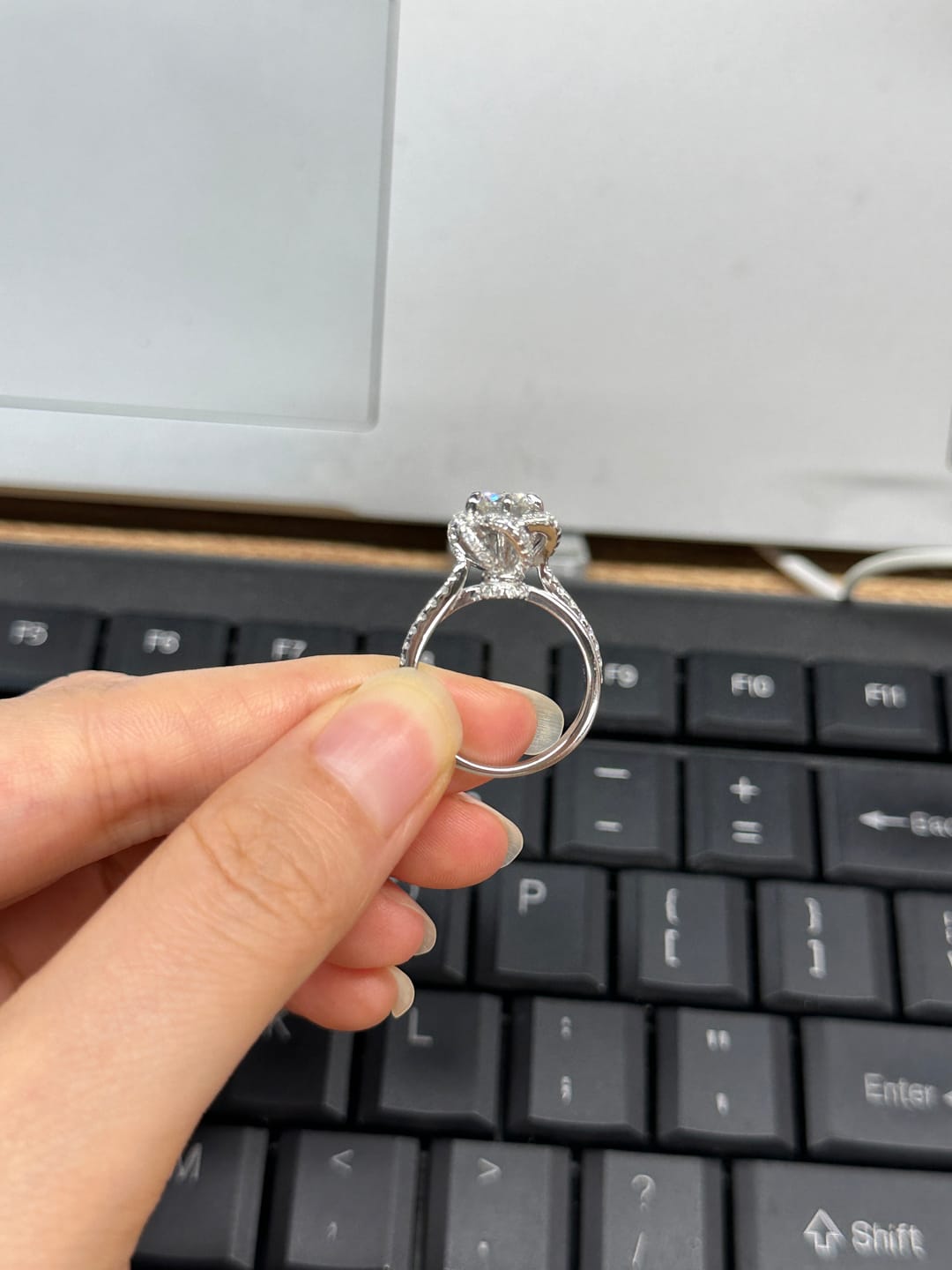 Customer photo review of S925 Moissanite 1.0CT Twist Flower Design Engagement Ring