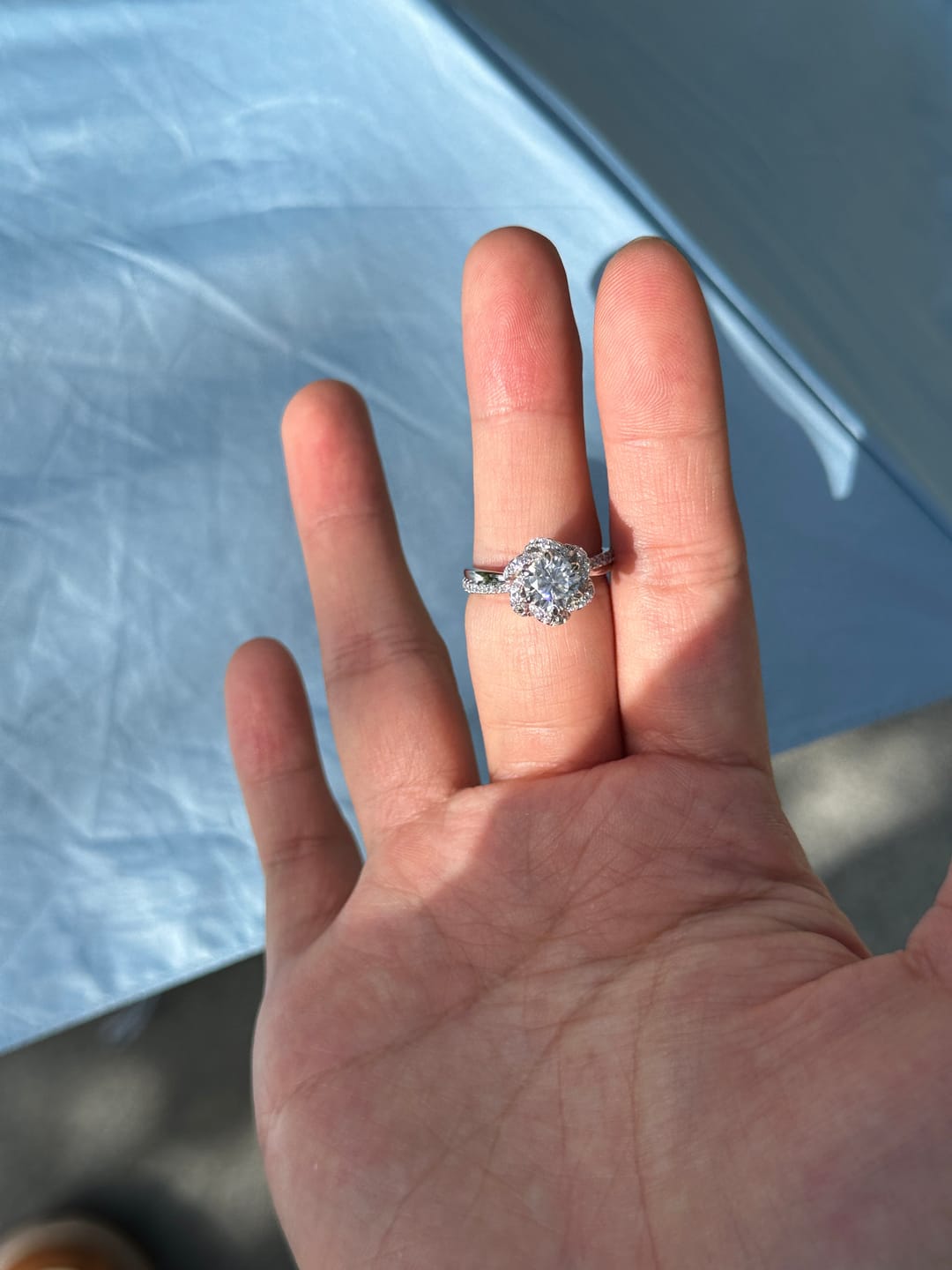 Customer photo review of S925 Moissanite 1.0CT Twist Flower Design Engagement Ring