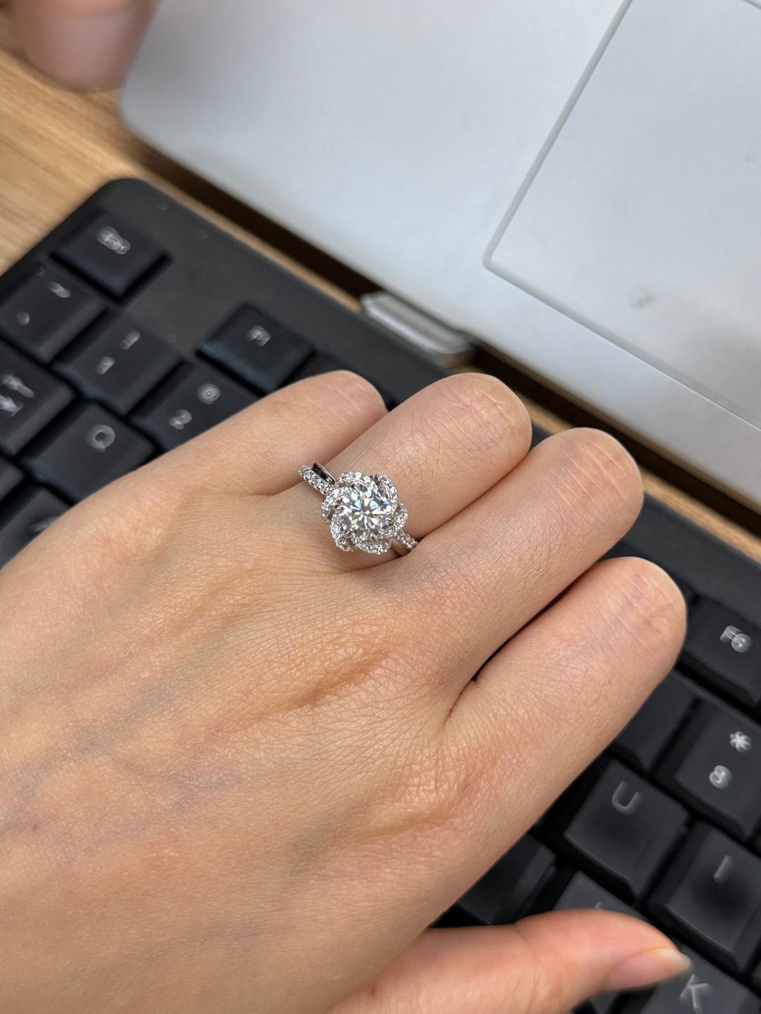 Customer photo review of S925 Moissanite 1.0CT Twist Flower Design Engagement Ring