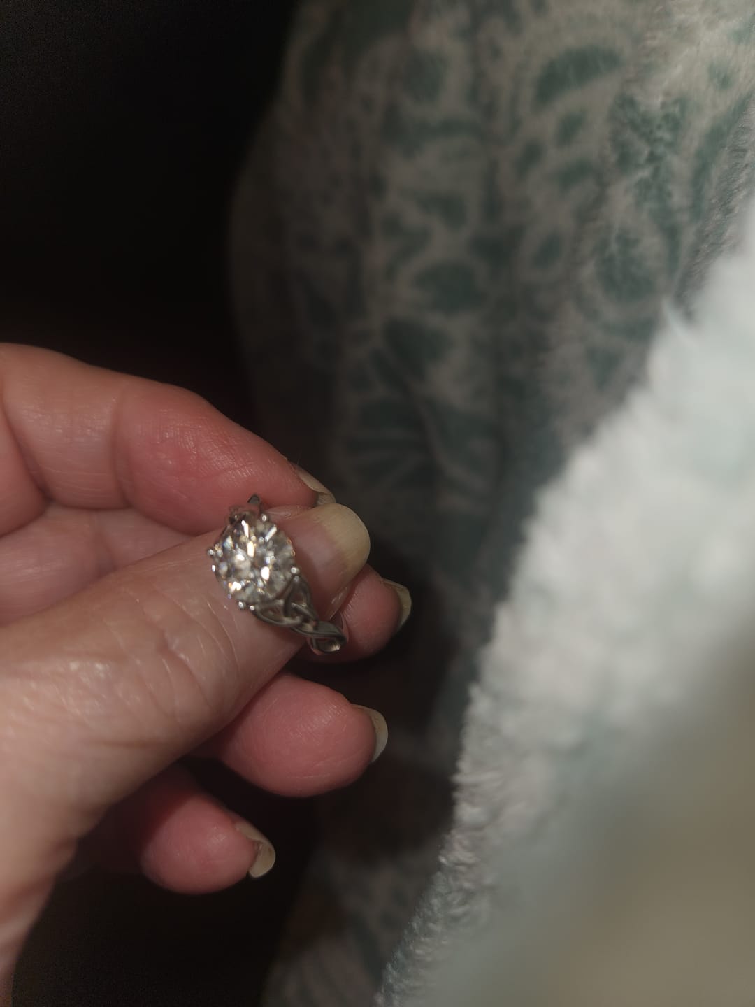 Customer photo review of Entwined Celtic Love Knot Solitaire Moissanite Engagement Ring
