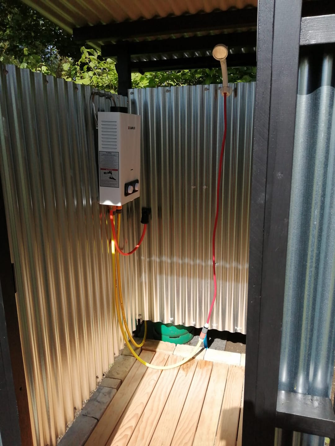 Customer photo review of CAMPLUX 6 litres Gas Pronpane Water Heater Instantaneous LPG Water Heater with Handle For Camping Shower&RV&Washing Horse