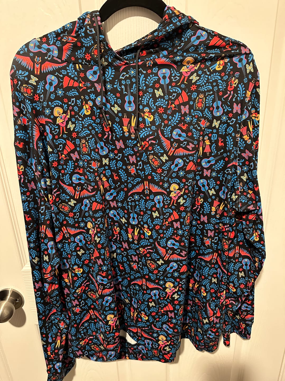 Customer photo review of Disney and Pixar Coco "Music In Me" – Performance Hoodie