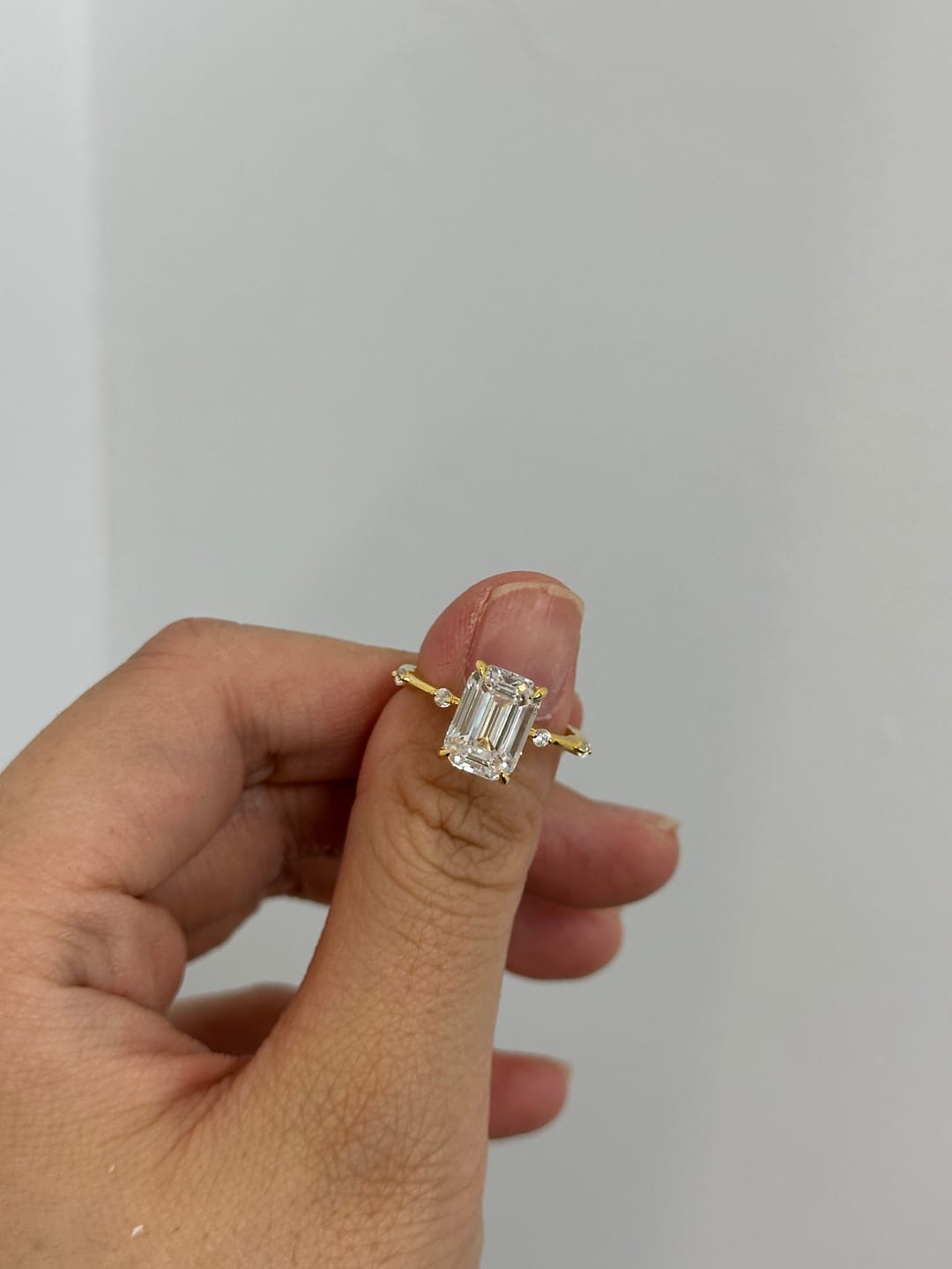 Customer photo review of Louily Unique Emerald Cut Engagement Ring For Women