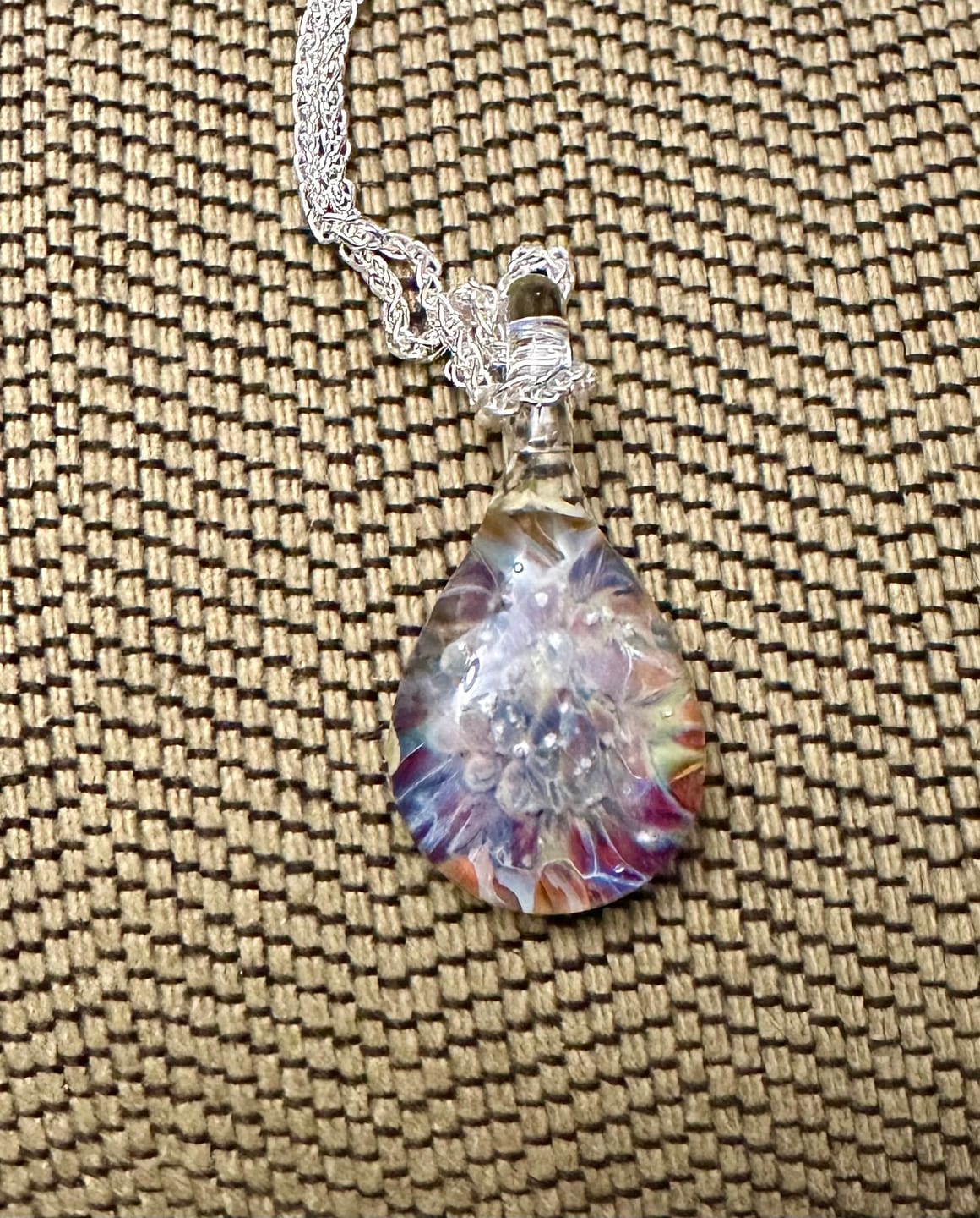 Customer photo review of Rainbow Sky Pendant with Infused Cremation Ashes