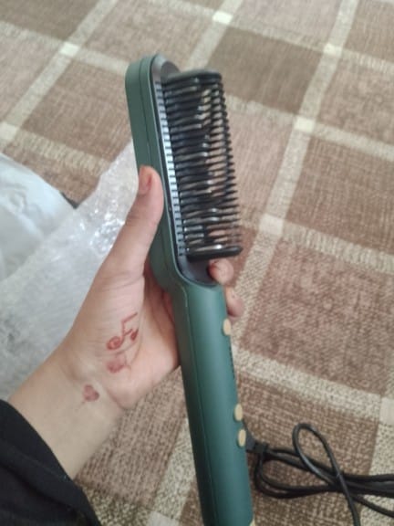 Customer photo review of 2 in 1 - Hair Straightener