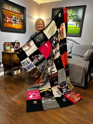 T-shirt quilt with travel, music themes by Stan from KY