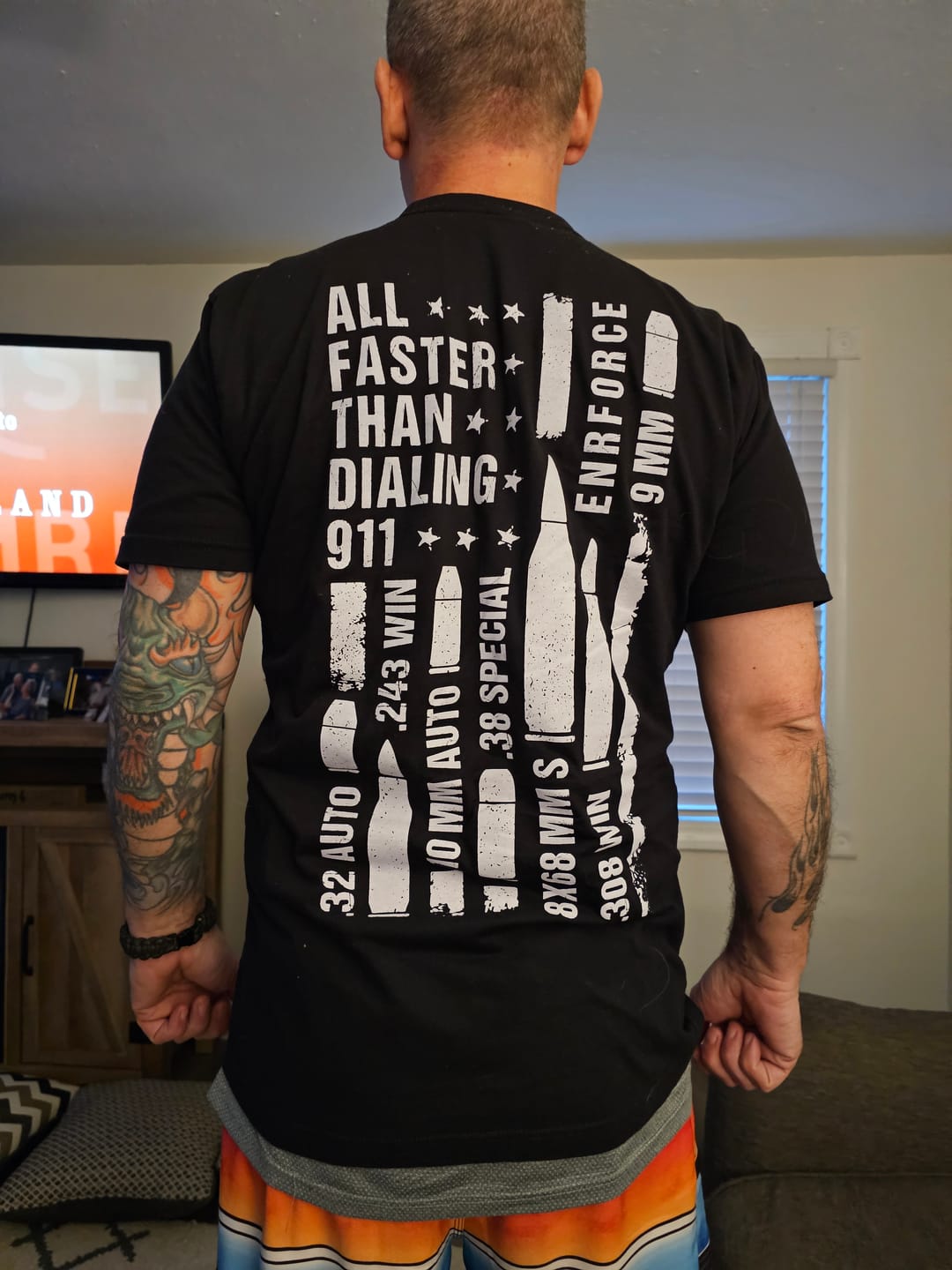 Customer photo review of All Faster Than Dialing 911 Tee