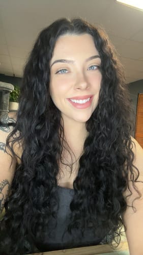 Customer photo review of Natural Black Spiral Clip-In Hair Extensions