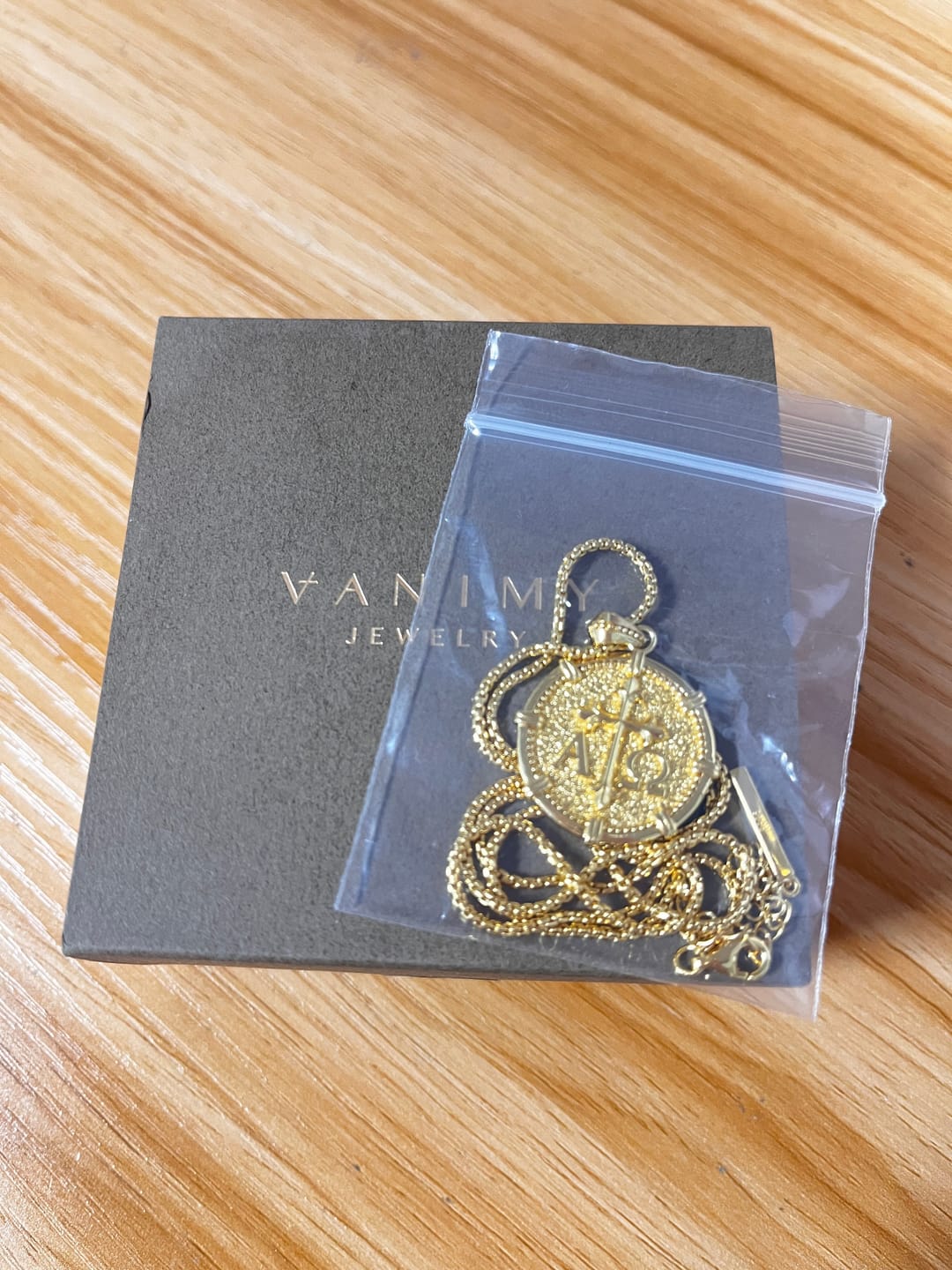 Customer photo review of Alpha Omega Fleur-de-Lis Cross Medallion Necklace