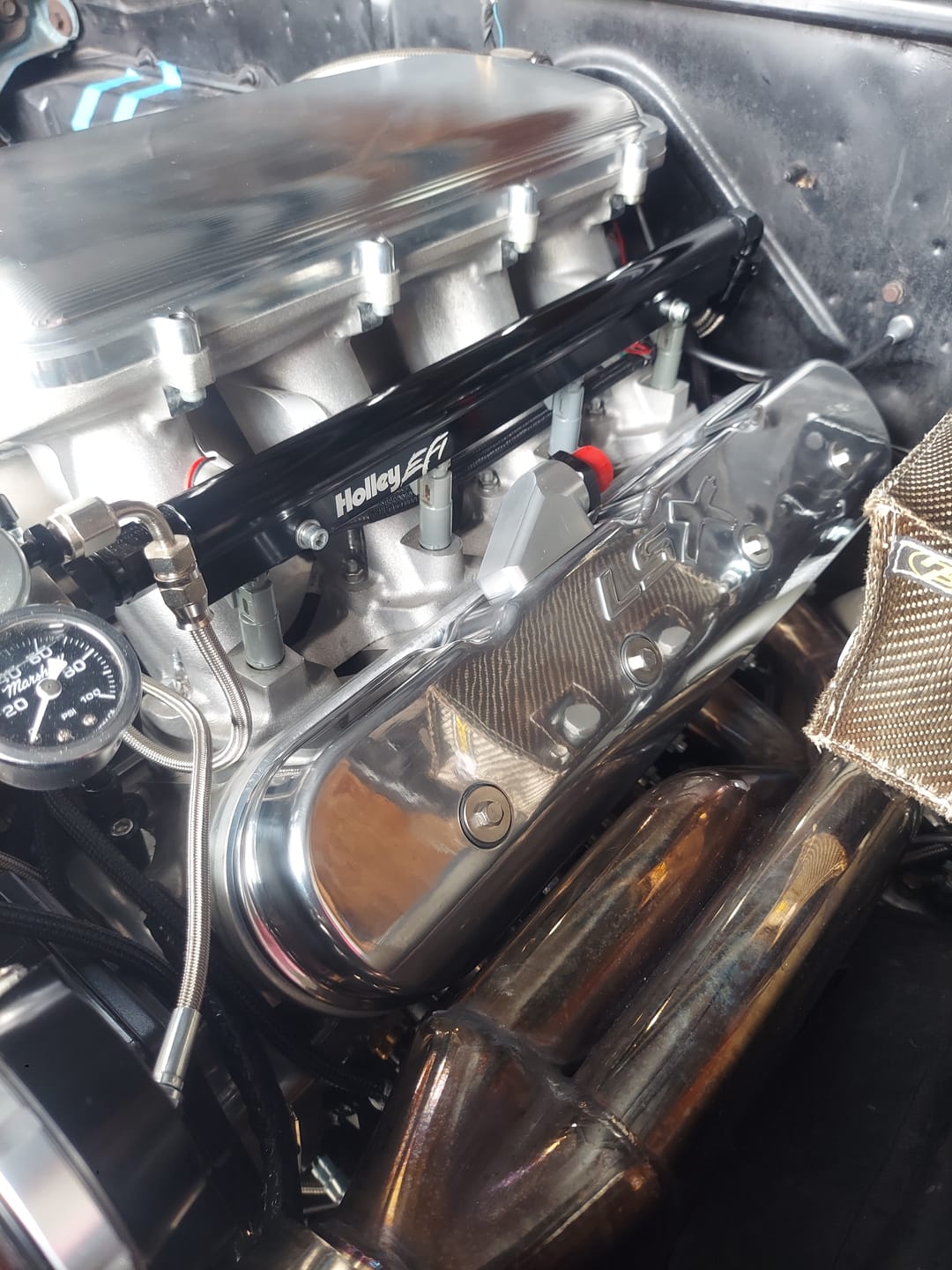 Customer photo review of Motion Raceworks Billet Valve Cover Breather / Oil Drain Billet (Single) 32-120-S