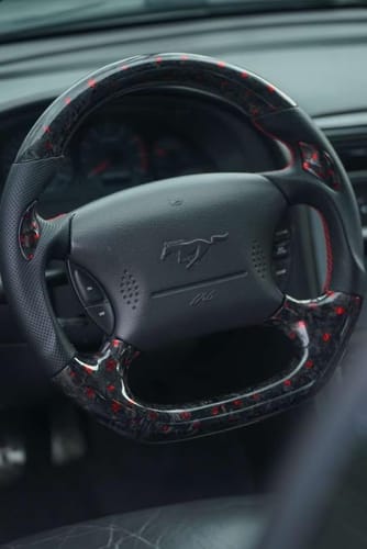 Customer photo review of 1994-2004 Ford Mustang custom carbon fiber steering wheel