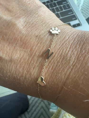 Customer photo review of 14K Solid Gold Paw Print Bracelet