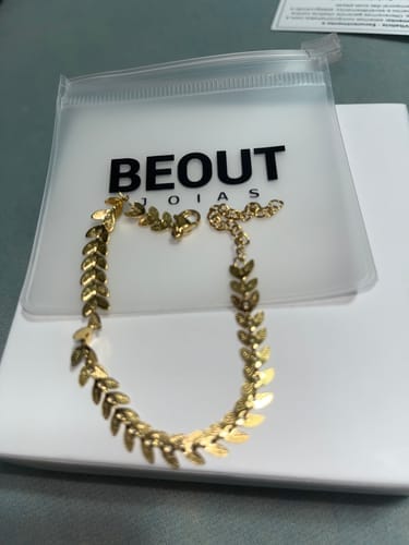 Customer photo review of Pulseira Pinhais Banhada em Ouro 18k