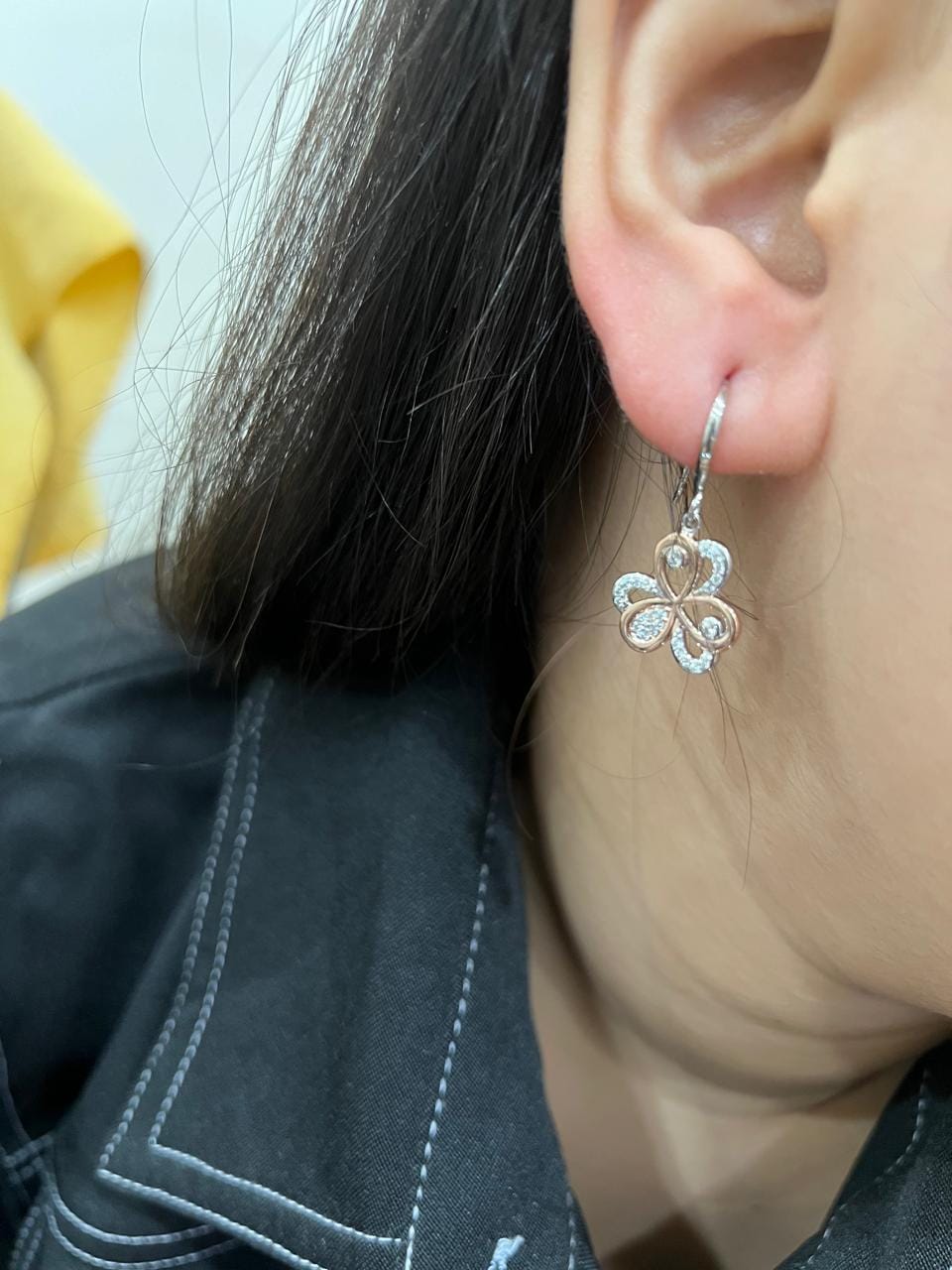 Customer photo review of Lucky Omen Dual-Tone Silver Earrings