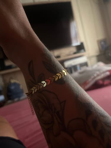Customer photo review of Pulseira Pinhais Banhada em Ouro 18k