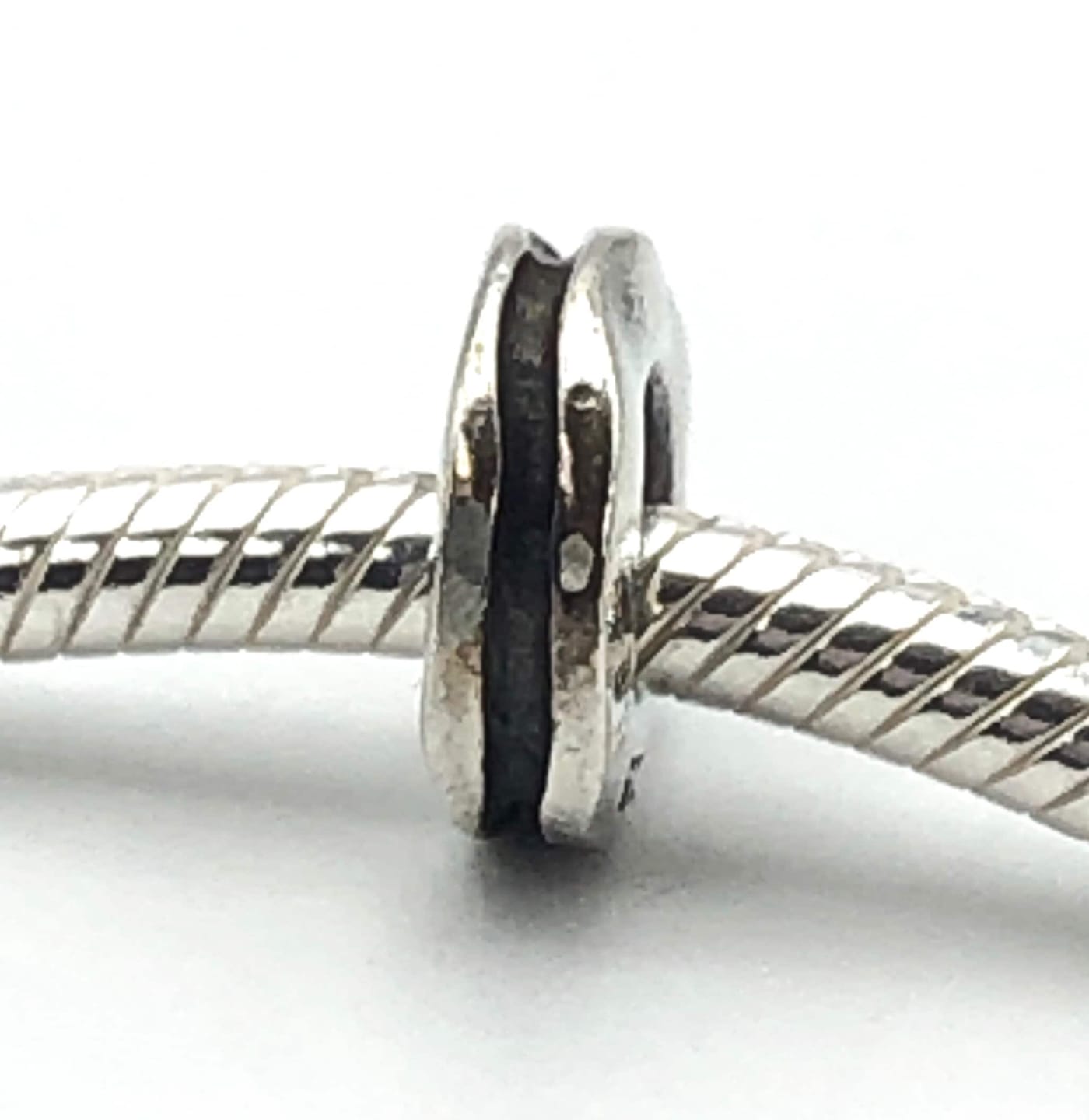 Customer photo review of PANDORA Crooked Line Sterling Silver Spacer Charm