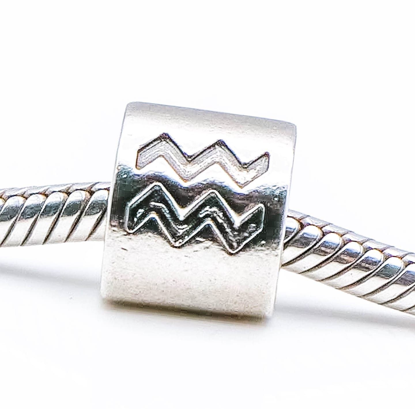 Customer photo review of PANDORA Aquarius Zodiac Sign Sterling Silver Charm