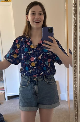 Customer photo review of Cosmic Cute Outer Space Button Up Shirt