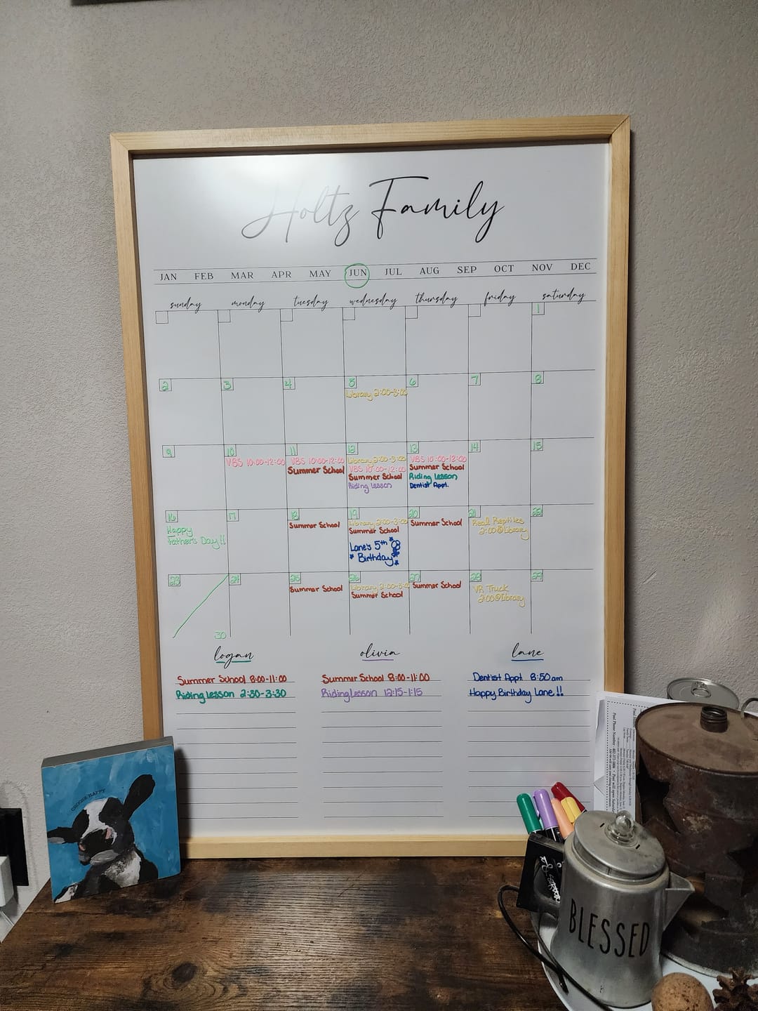 Customer photo review of Monthly Framed Whiteboard Calendar + 3 sections | Vertical Pennington