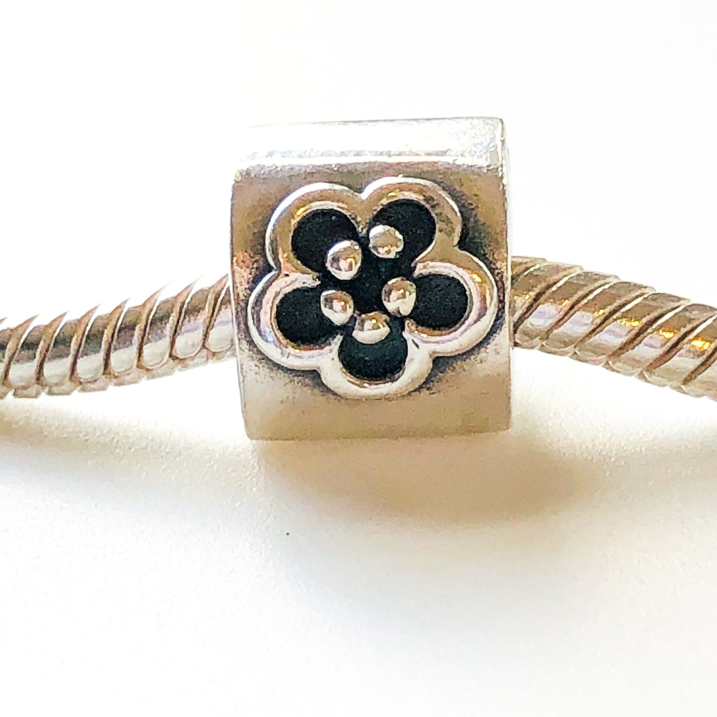 Customer photo review of PANDORA DAISY CHARM Bead #790187 Sterling Silver Retired