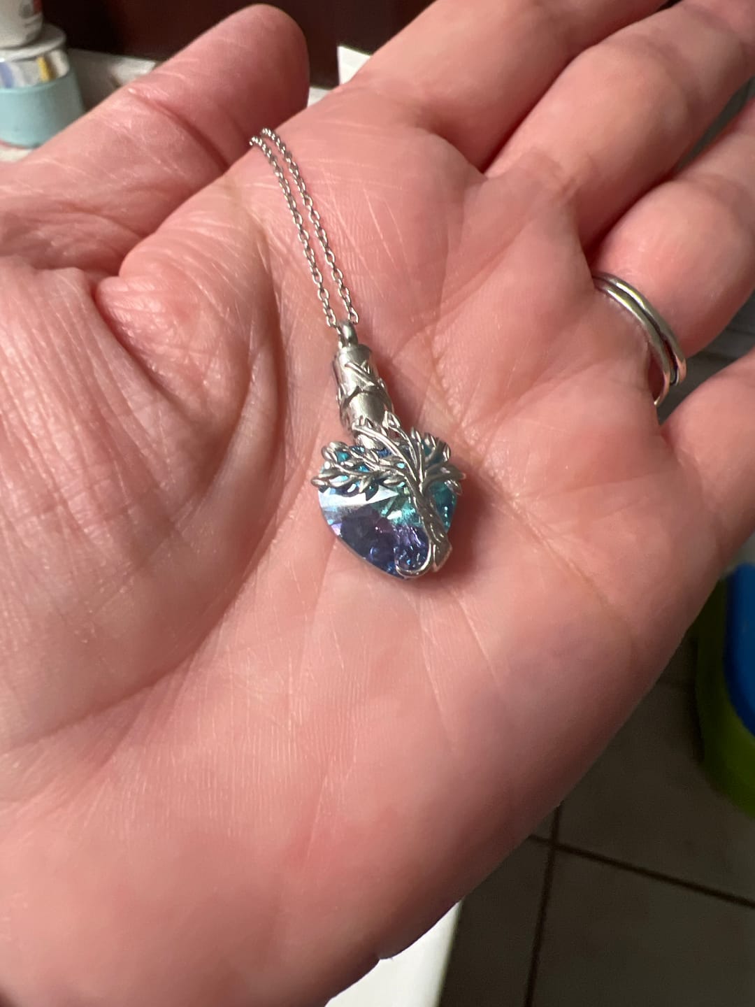 Customer photo review of Crystal Cremation Necklace - Tree of Life Keepsake Urn