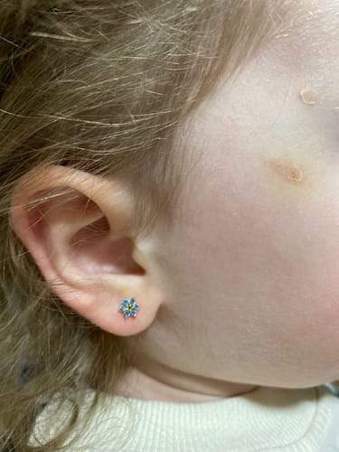 Customer photo review of AROS DE NIÑA FLOR BLUE BAÑO DE ORO