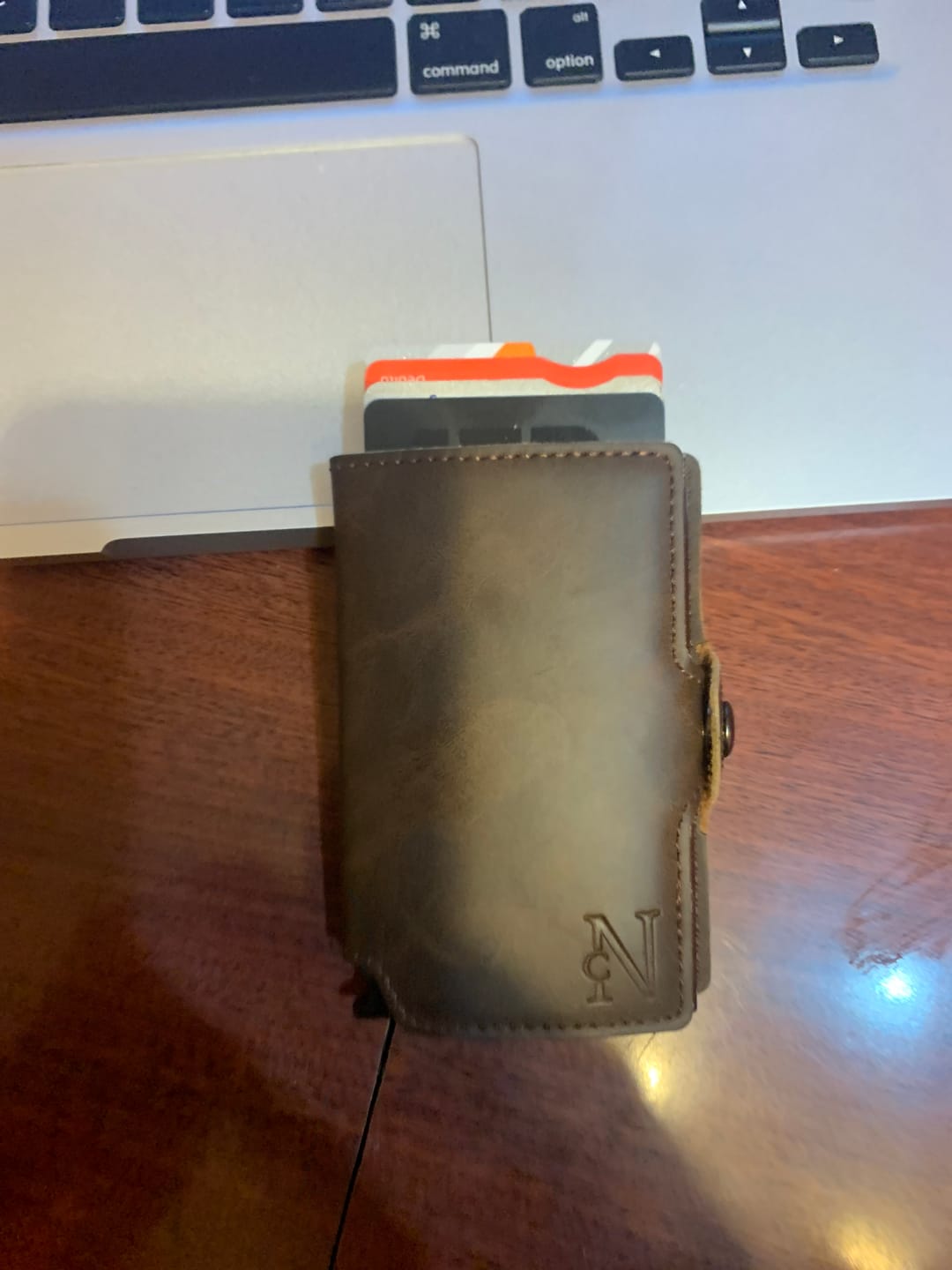 Customer photo review of Billetera New Concept Woolrich Dark Brown
