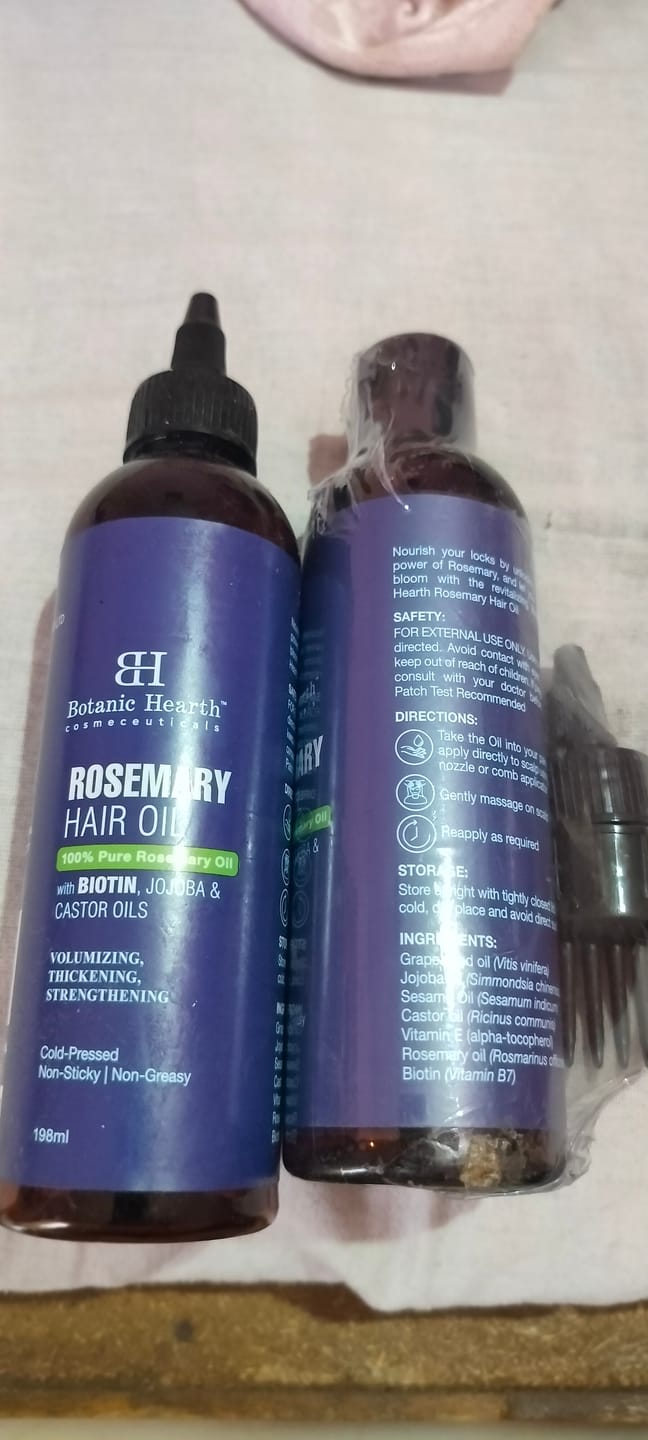Customer photo review of 100% Pure Rosemary Oil For Hair Growth Infused With Biotin | 198 ML