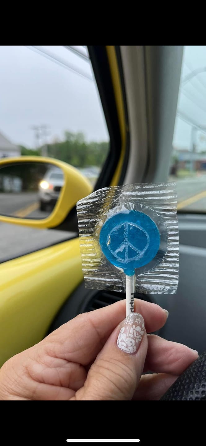 Customer photo review of Hippie Shop Peace Pop Lollipops