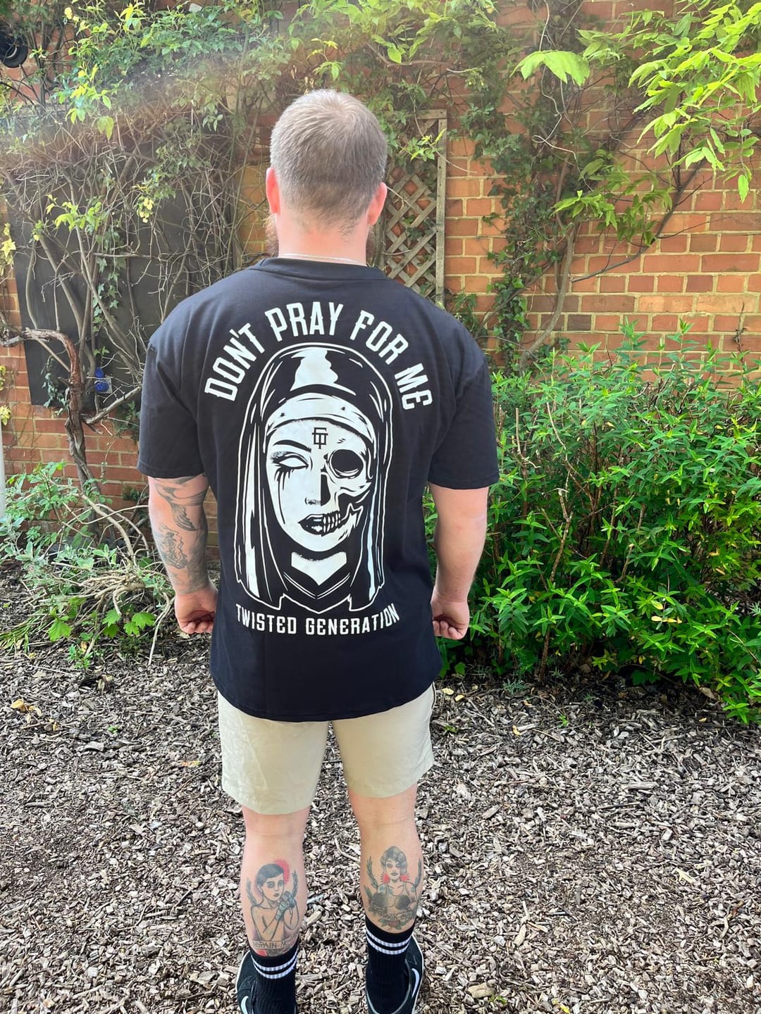 Customer photo review of Nun Oversized T-shirt - Don't Pray For Me