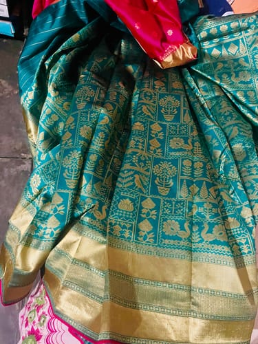 Customer photo review of Maharani Green Woven Banarasi Soft Silk Saree