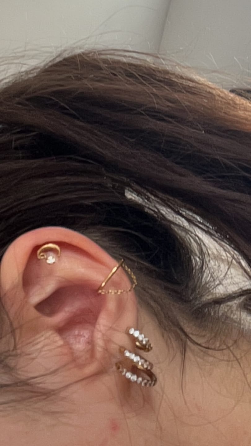 Customer photo review of Stone Moon Piercing | Titan
