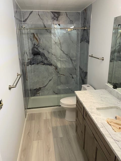 Customer photo review of Continental Carrara Marble Wall Panel 96" X 48"