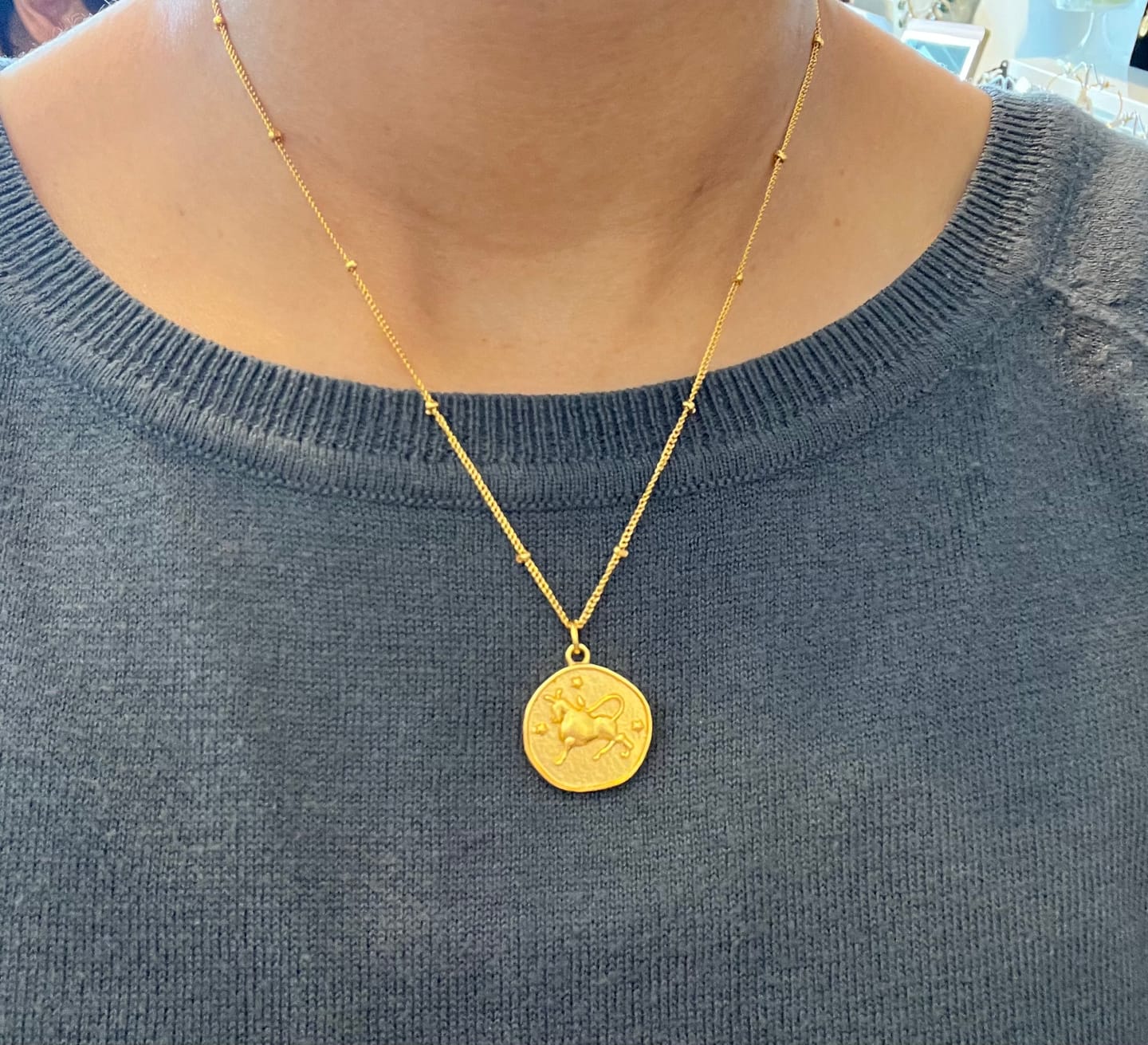 Customer photo review of Horoscope Pendant