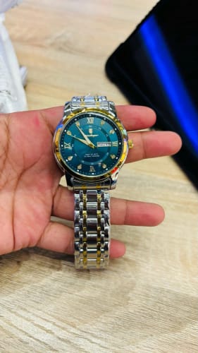 Customer photo review of ELEGANCE® 936 Luxury Watch for Man Elegant Date Week Waterproof Luminous Men Watch Quartz Stainless Steel Sports Men's Watches