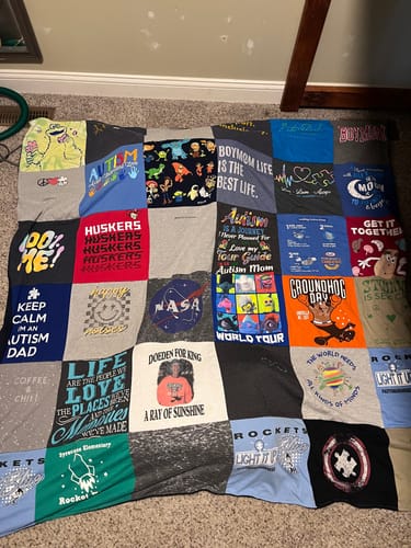 T-shirt quilt with autism awareness, sports themes by Suzanna from NE