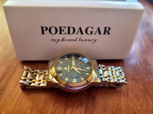 Customer photo review of ELEGANCE® 936 Luxury Watch for Man Elegant Date Week Waterproof Luminous Men Watch Quartz Stainless Steel Sports Men's Watches