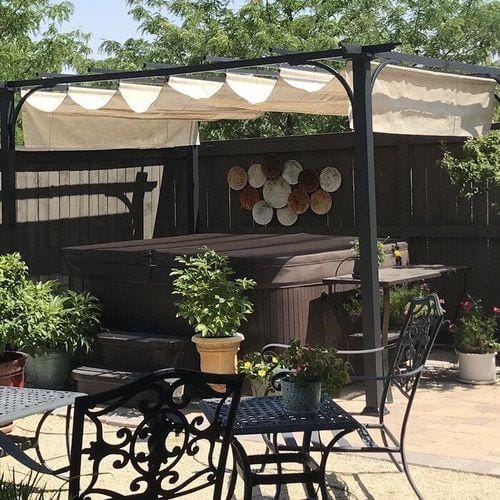Customer photo review of Sunjoy 9' x 12' Black Steel Frame Pergola Kit with Retractable Beige Canopy Shade
