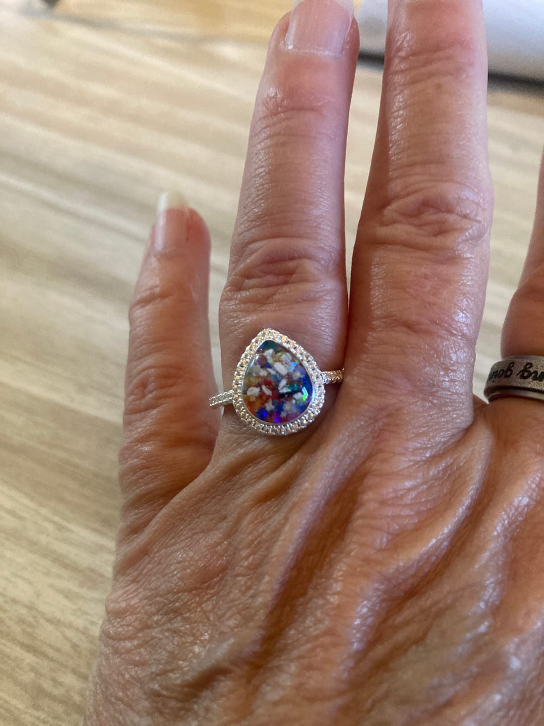Customer photo review of Bedazzled Pear Opal Ring with Cremation Ashes