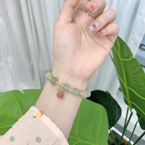 Customer photo review of Natural Hetian jade Feng Shui Peach Bracelet
