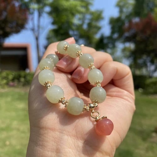 Customer photo review of Natural Hetian jade Feng Shui Peach Bracelet