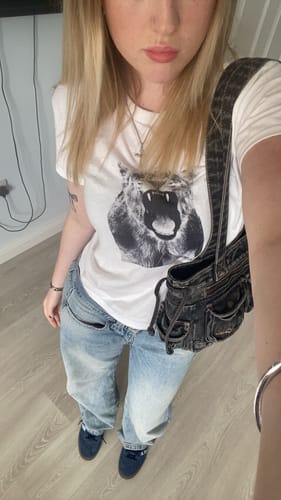 Customer photo review of 'Roar' baby tee