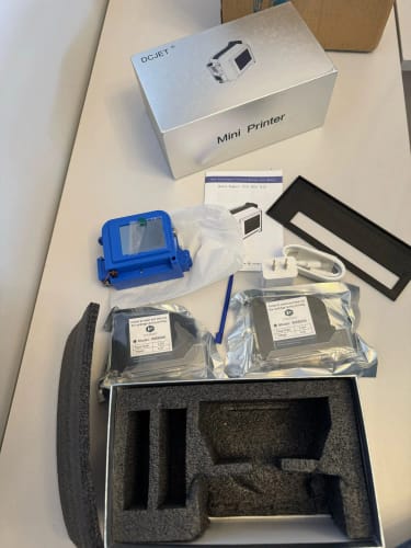 Customer photo review of Mini PrintPeak Handheld Inkjet Printer - Perfect for Curved Surfaces