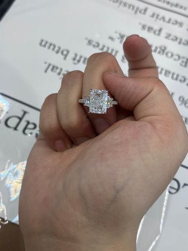 Customer photo review of Louily Stunning Crushed Ice Radiant Cut Three Stone Engagement Ring In Sterling Silver